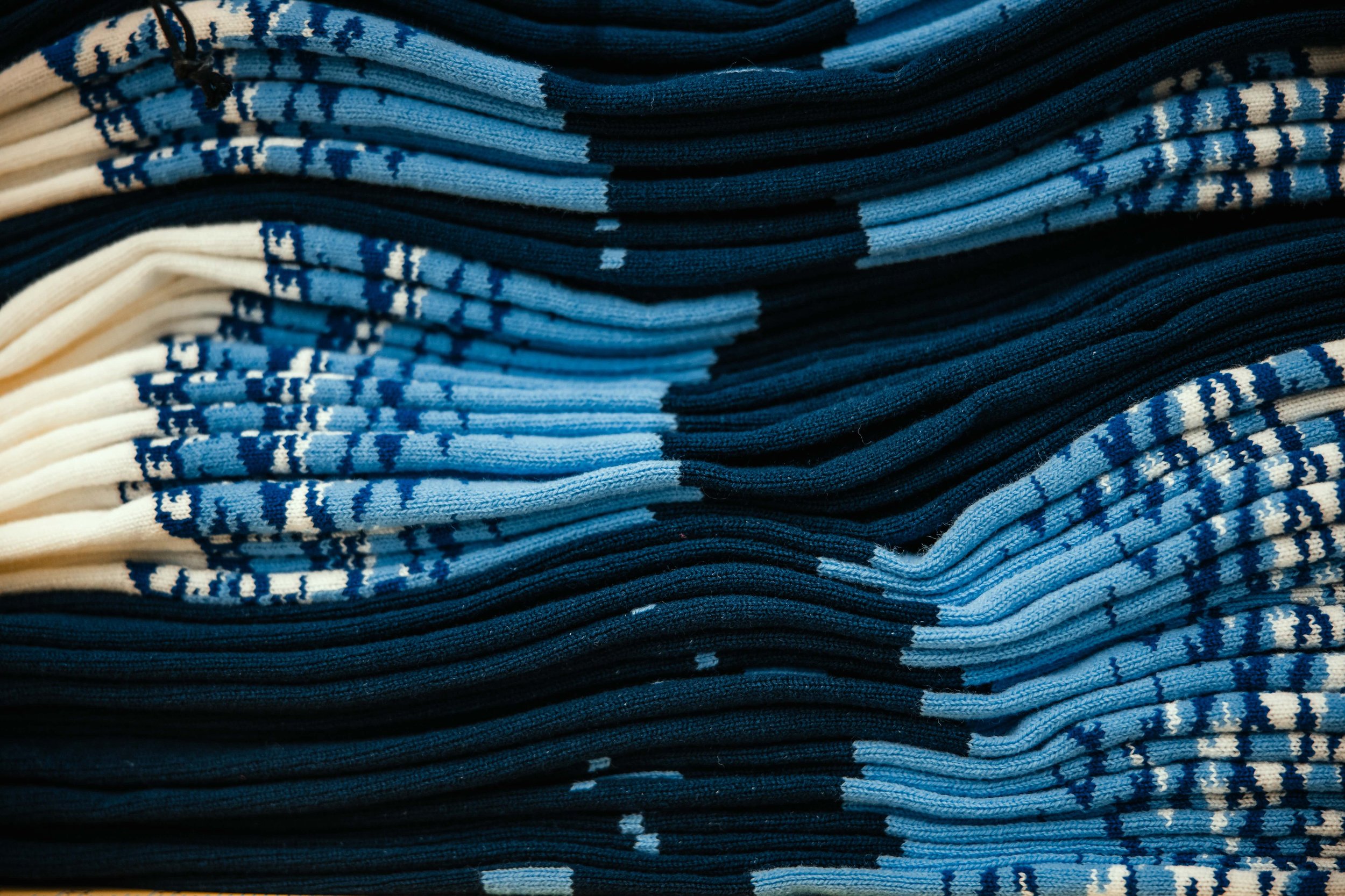 a stack of beanies ready to be shipped out