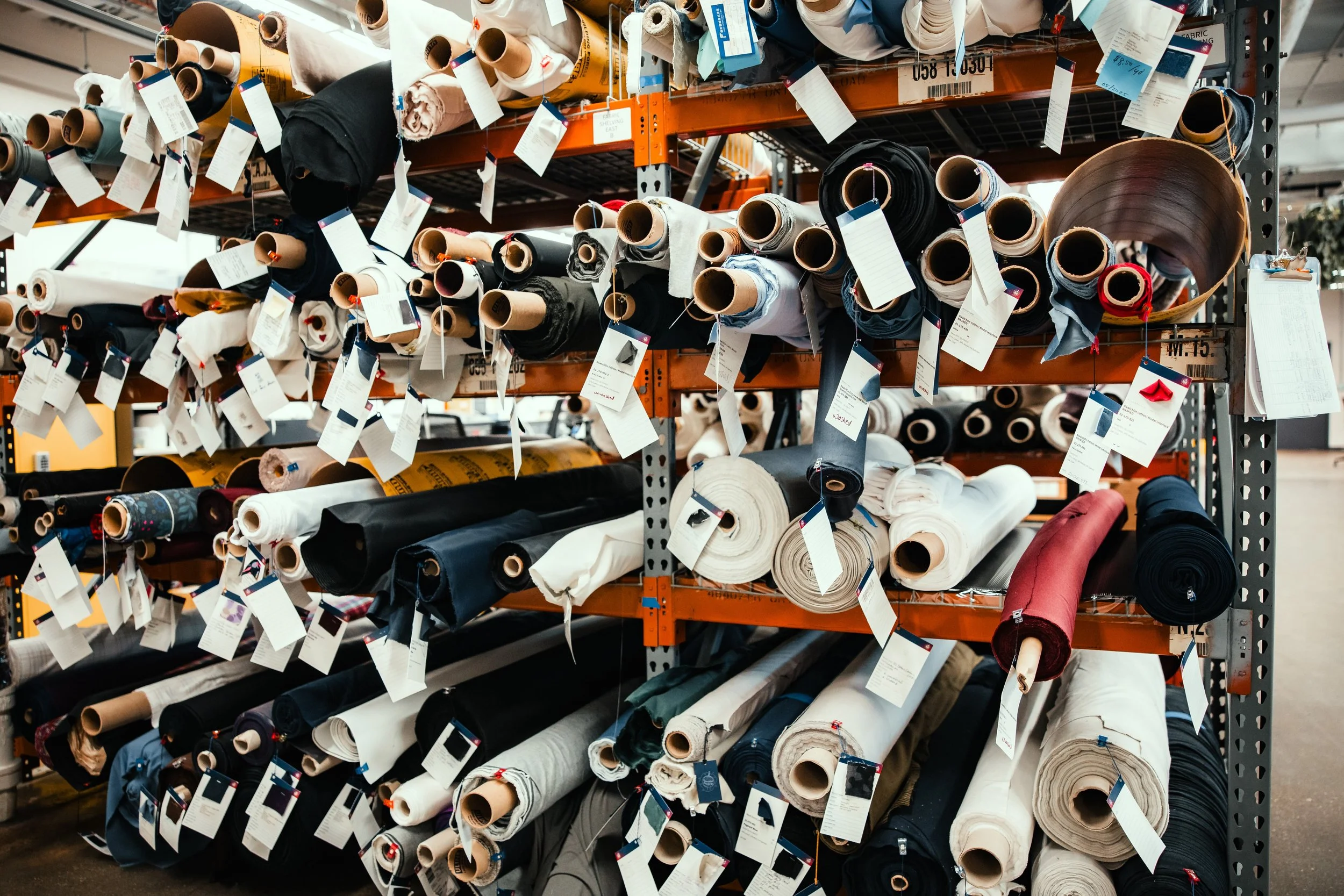 fabric rolls at fourbital factory for making custom beanies