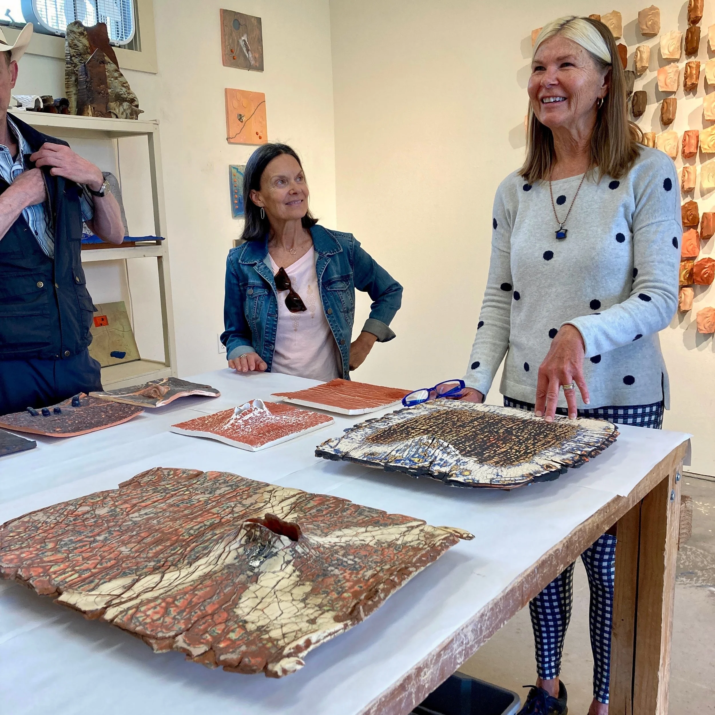 Nancy showing recent artwork in her studio