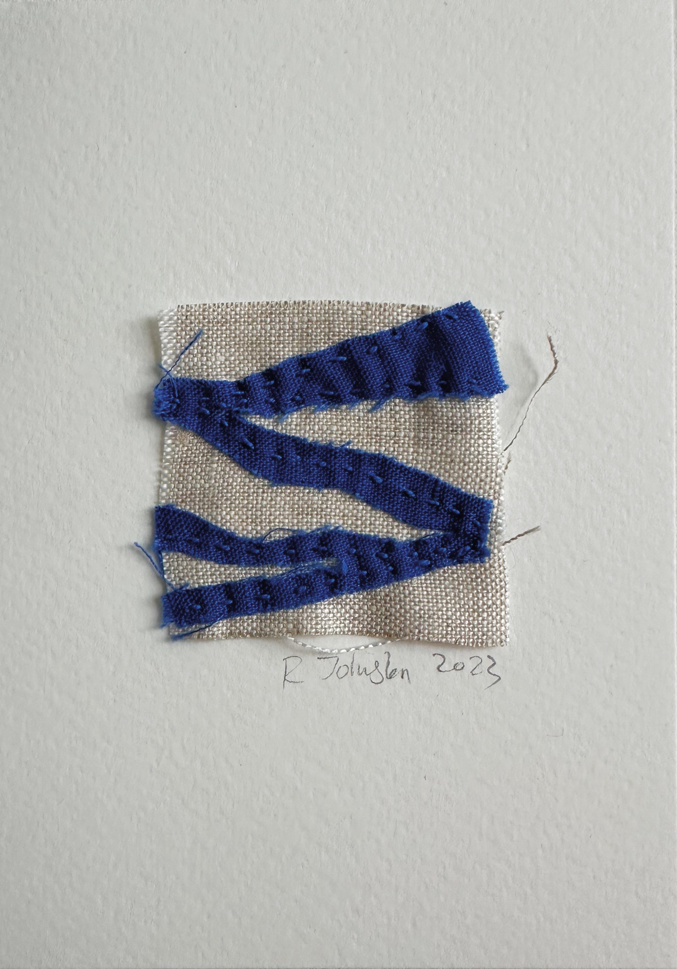 Blue Lines stitch and fabric drawing. Deep blue cotton on natural linen mounted on to off white paper.
