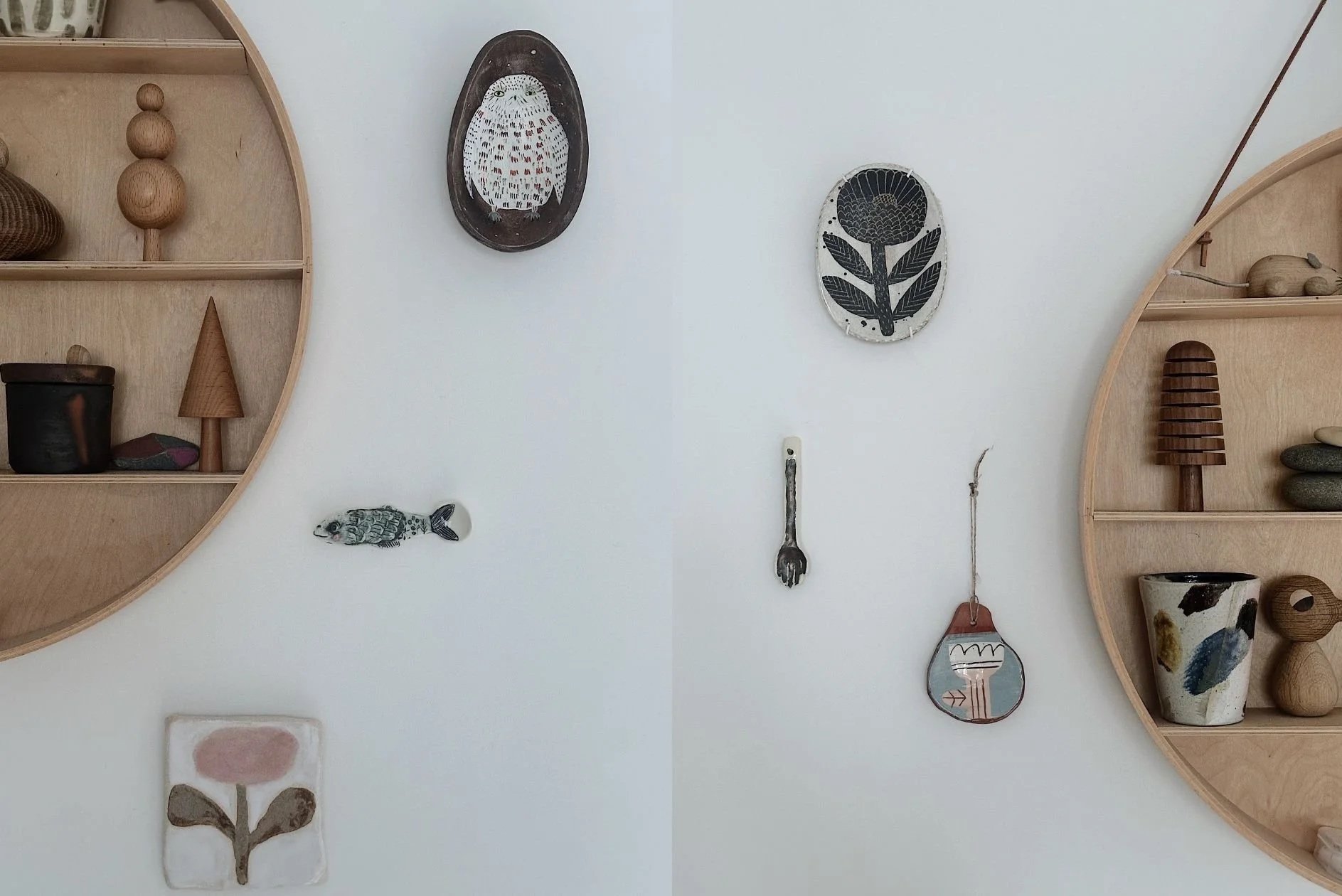 Collection of folk inspired wooden and ceramic objects surrounding a circular wooden shelf