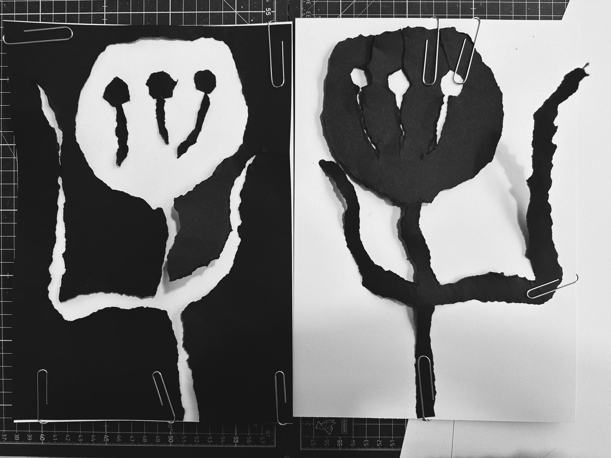 Torn collage notan experiment in black and white by Rebekah Johnston