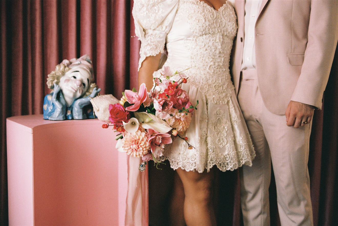 Pink silk bridal bouquet and wedding flowers at a Las Vegas chapel elopement at the Sure Thing Chapel