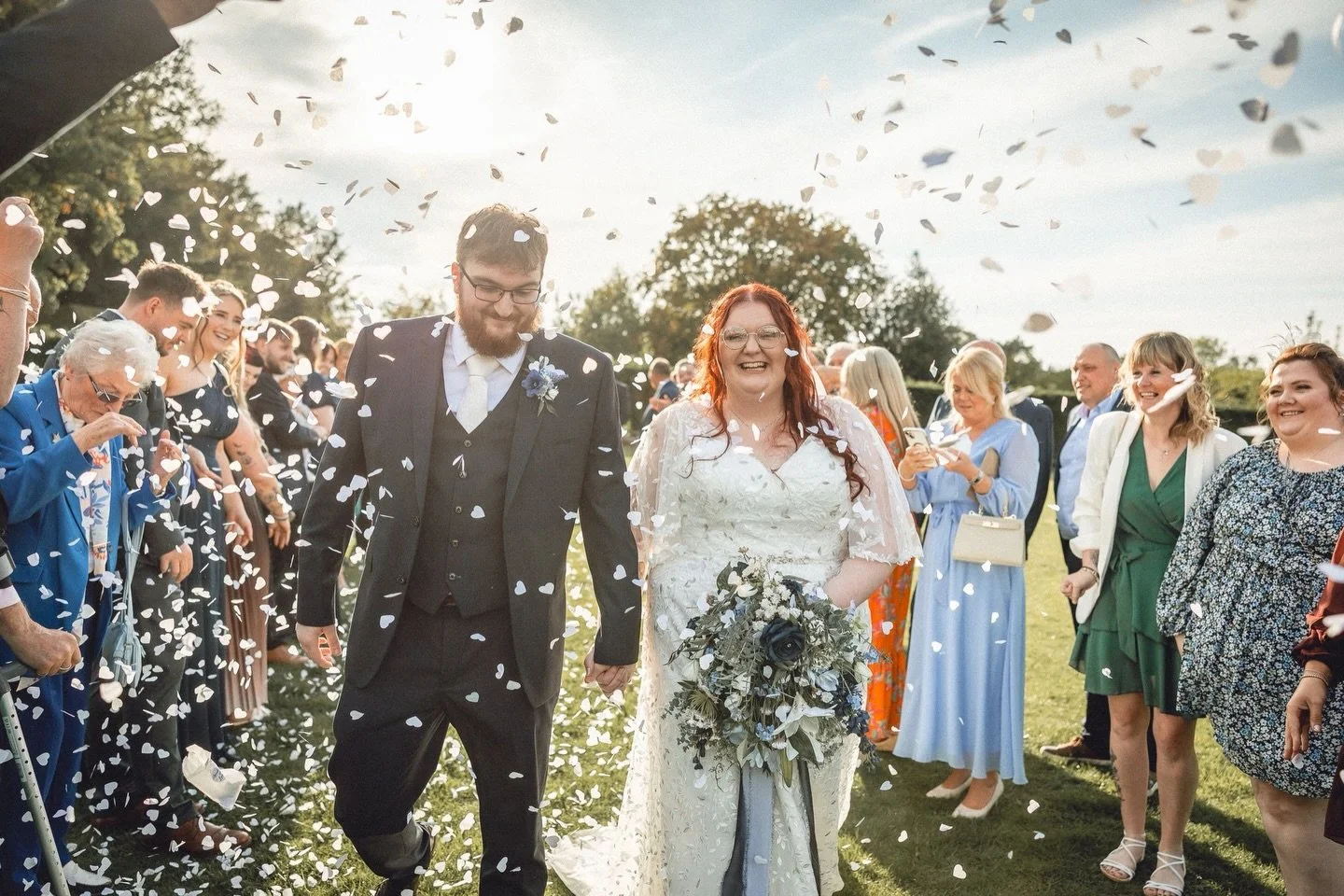 That just-married feeling 🥹✨

Libby &amp; Dale stepping into married life surrounded by confetti, smiles, and their favourite people &mdash; honestly, this moment says it all 💙

I&rsquo;ll never get bored of seeing my flowers right in the middle of