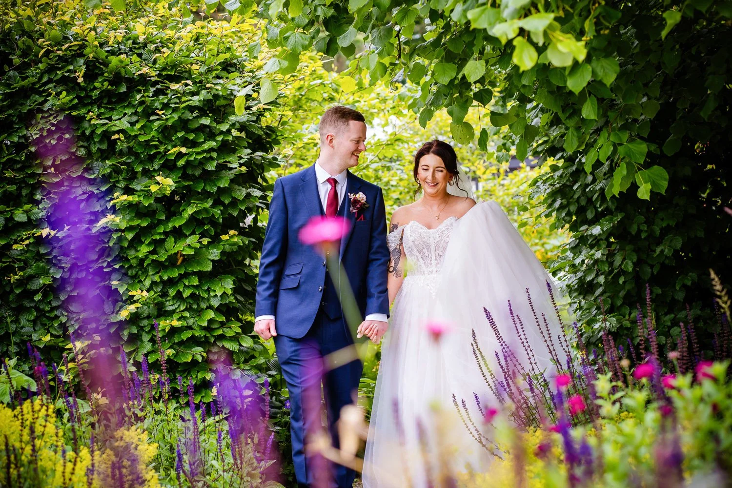 Rustic silk wedding florals with rich tones and romantic movement for a fairytale feel.