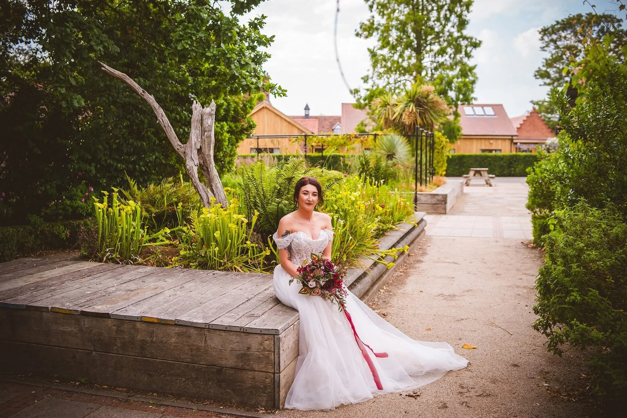 Alternative silk wedding florals combining gothic elegance with soft seasonal colour.