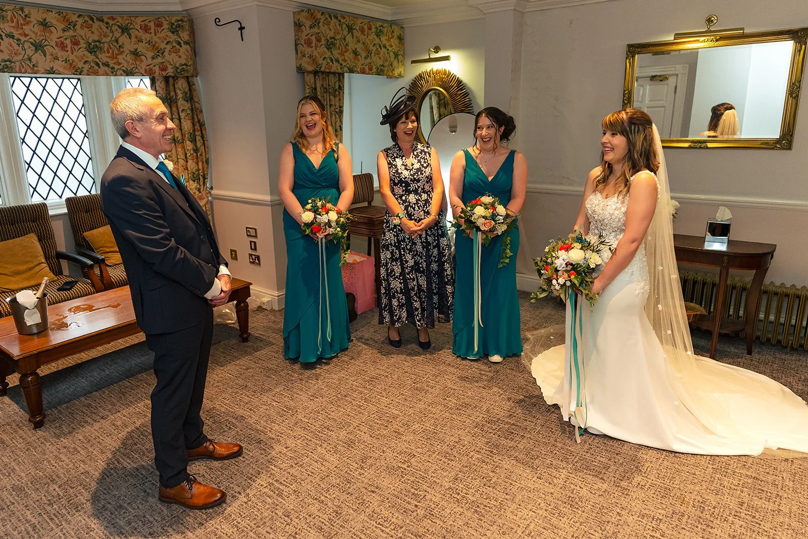 Father’s first look ahead of Emma and Toms Teal wedding at Crewe Hall