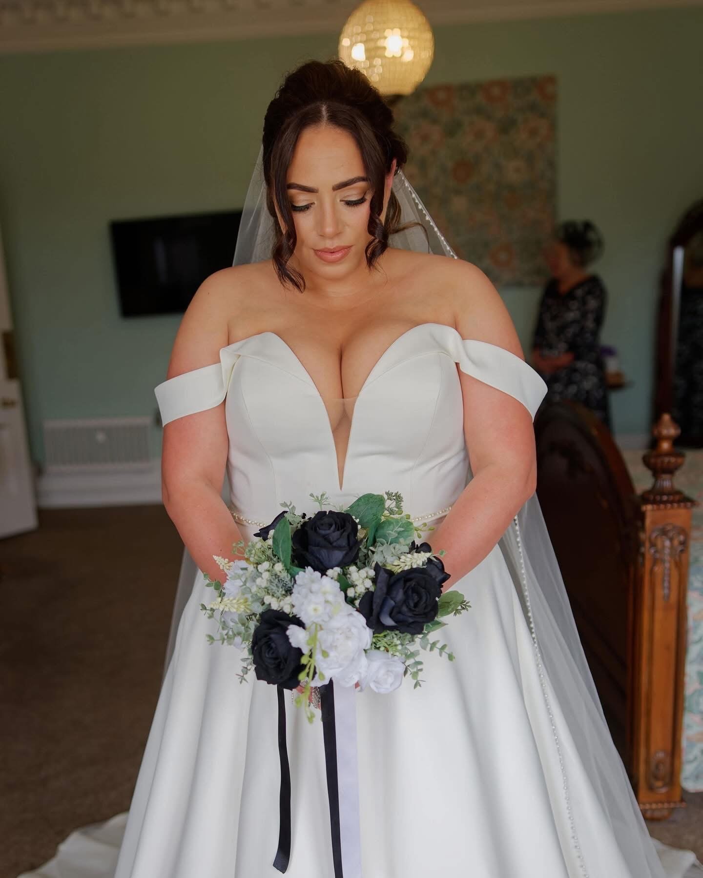 Elegant silk wedding flowers in a monochrome theme