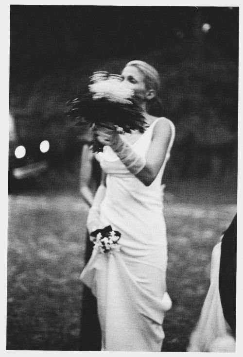 carolyn bessette on her wedding day wearing a narciso rodriguez gown.jpg