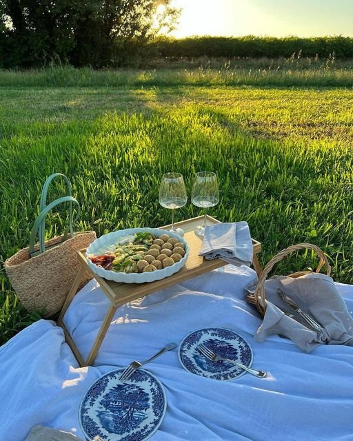 The Italy Insider on Instagram_ _A light aperitivo in the countryside fields that feels like a never ending summer_ just the two of you, white wine in a pic nic moment surrounded by green trees_ Who’s joining you_ Tag your +1! ⠀⠀⠀.jpeg