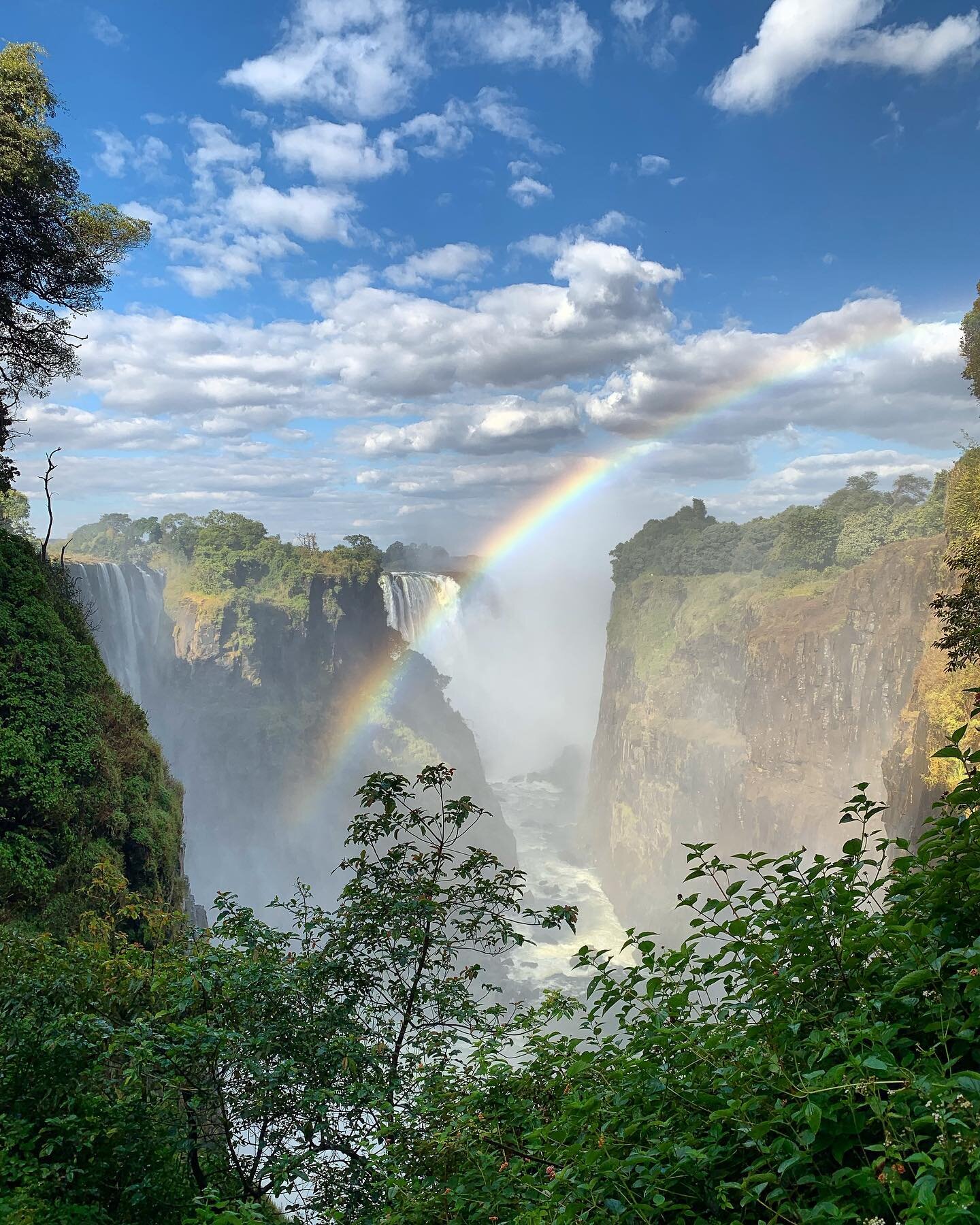 What a magical place! 💦🌈
Excited to be planning our next adventure! 
#victoriafalls #zimbabwe #africa #rainbow #waterfall #naturalwonder #itlooksfake #waitwasitfake