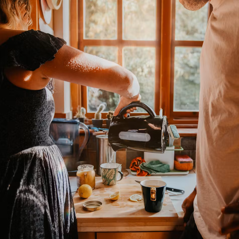 husband and wife dividing chores | emotional labor burden in relationship looking for therapist in nyc