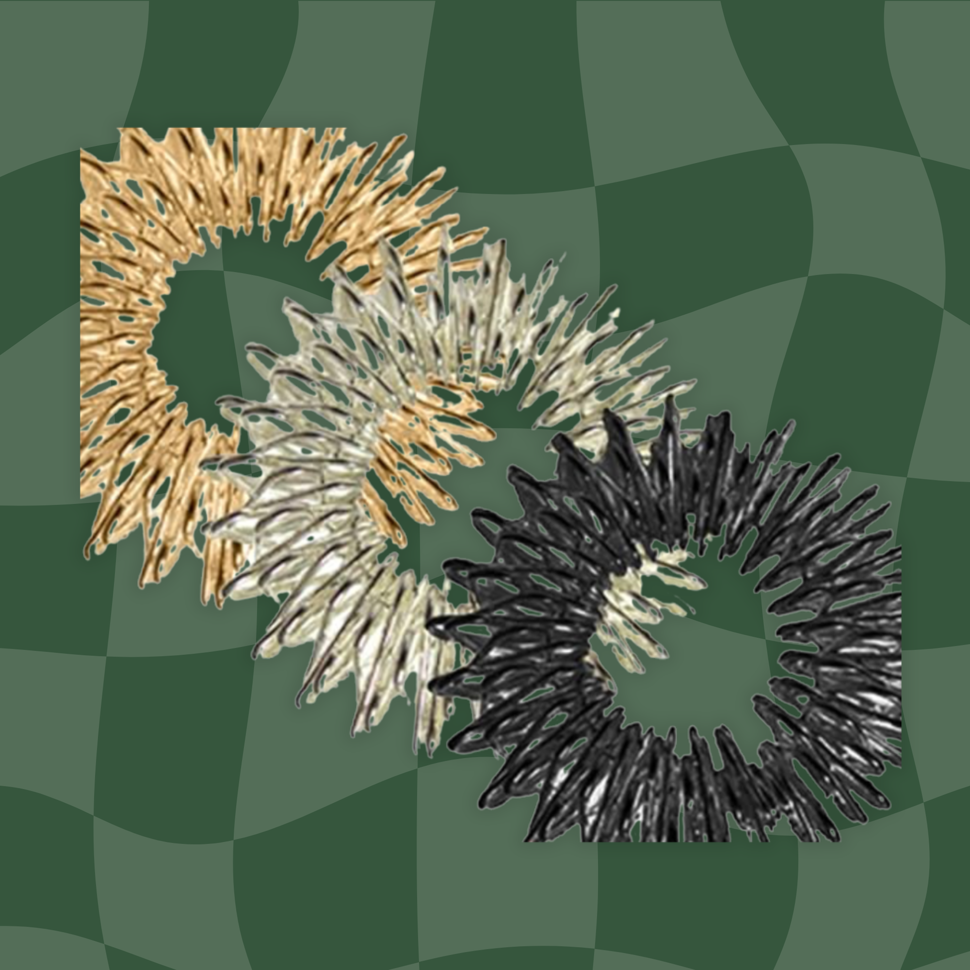 Close-up of acupressure rings of various colors on a green background.