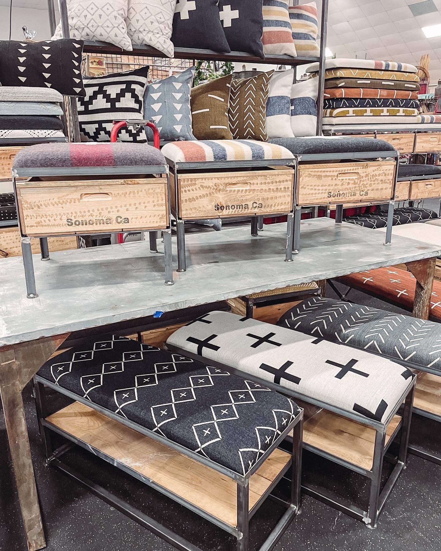 Rustic style benches on display