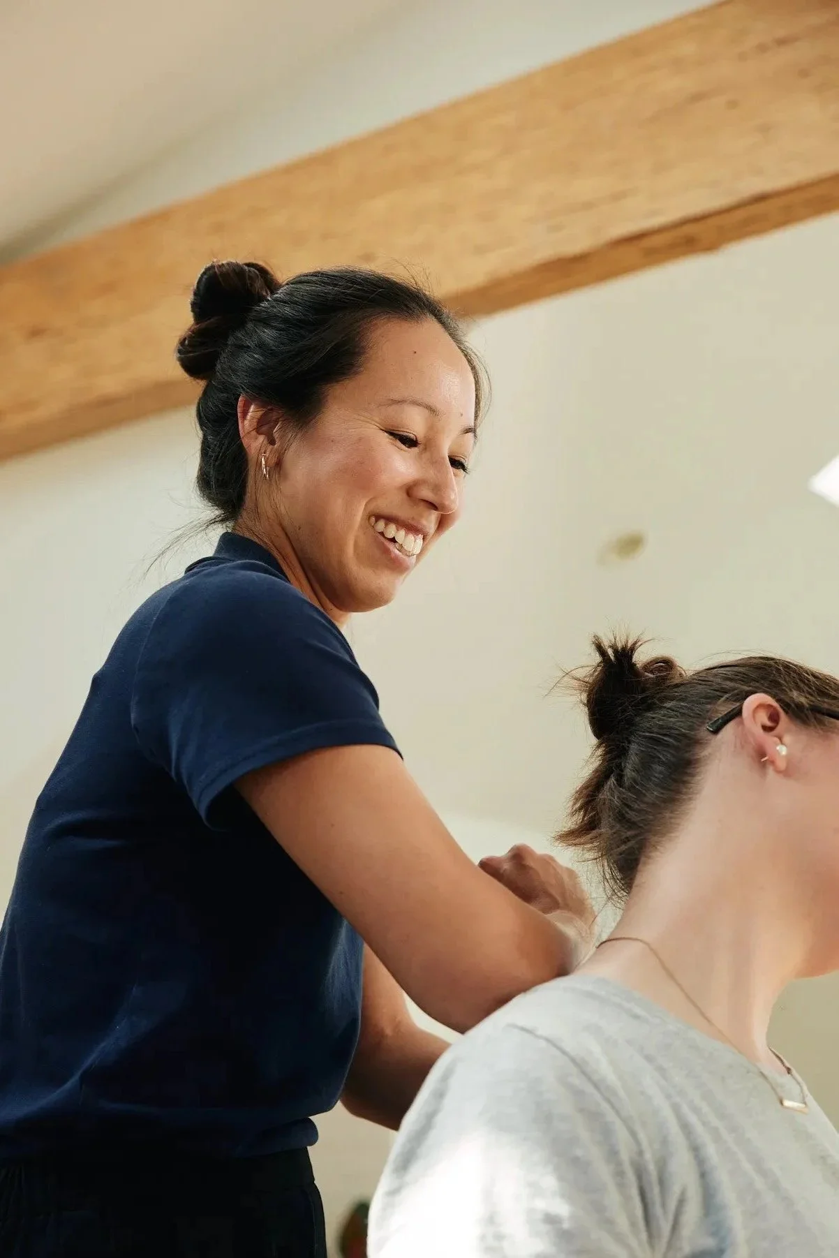 Physiotherapist providing in-home physiotherapy care to a client in Calgary.