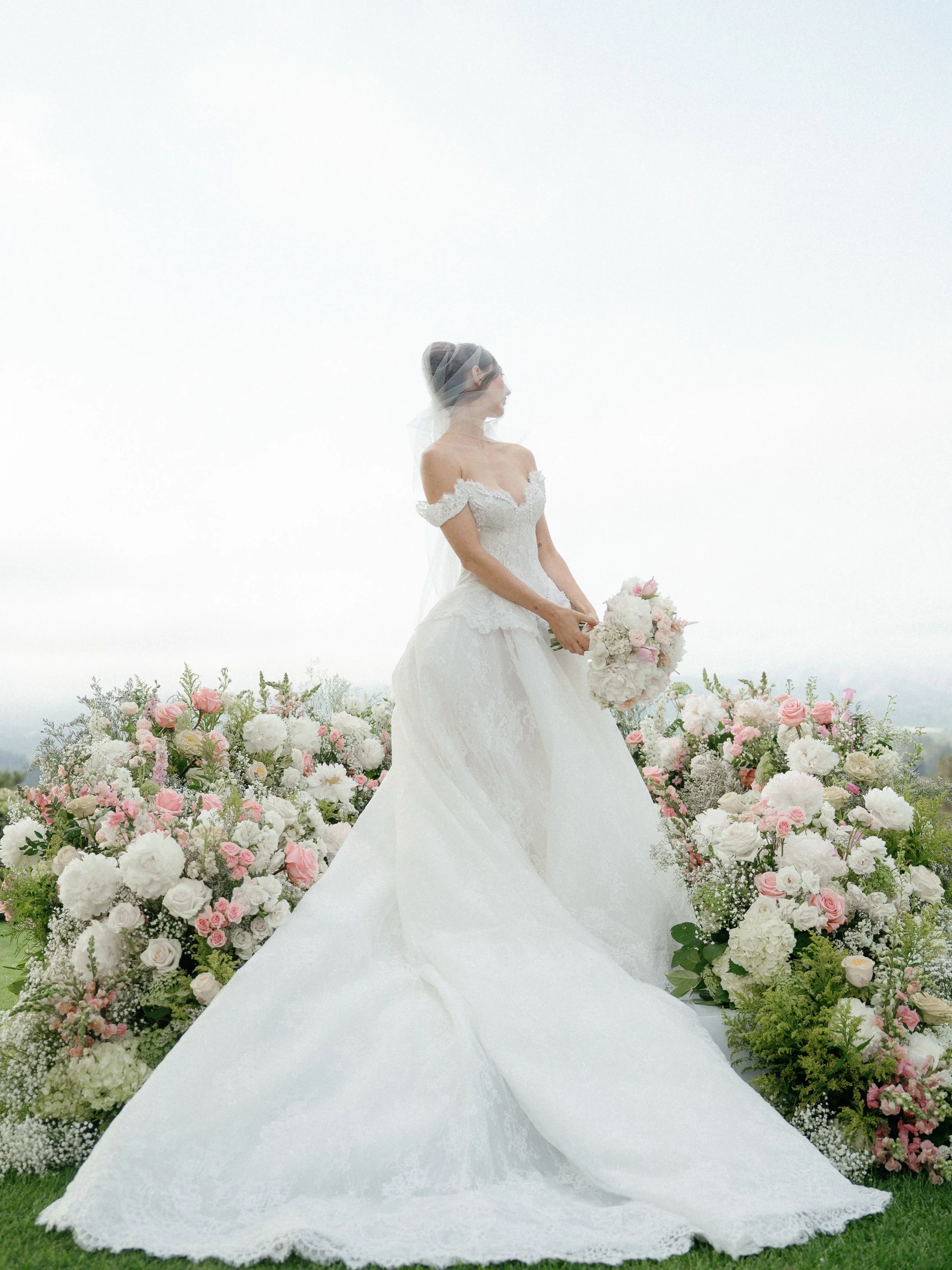 A moment for Faye, her @pallascoutureprivee gown and @kateflowersla all working together in harmony ☁️

THE TEAM
Planning and Design @eventsbytania_ 
Venues @westlakevillageinn @spanishhillsspecialevents 
Photo @rachelwakefield 
Video @tieandveil 
Fl