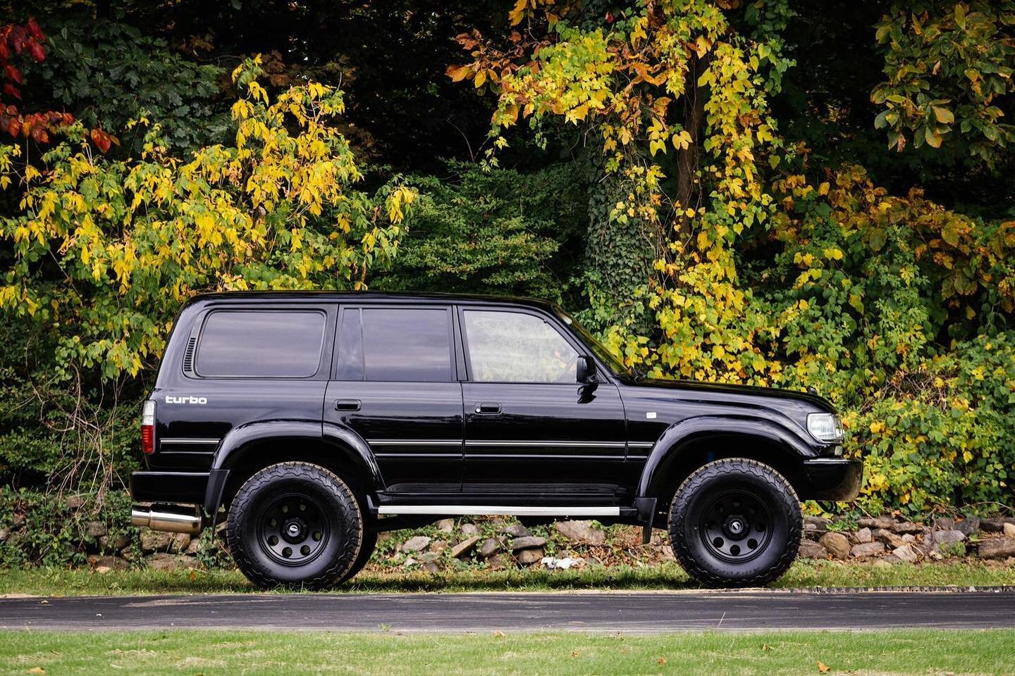 This triple locked 1993 Toyota Land Cruiser HDJ81 is a Japanese-market example that was imported into the US in 2021. The truck is finished in Black over a gray cloth interior and is powered by the legendary Toyota 4.2L 12-valve turbo diesel inline-s