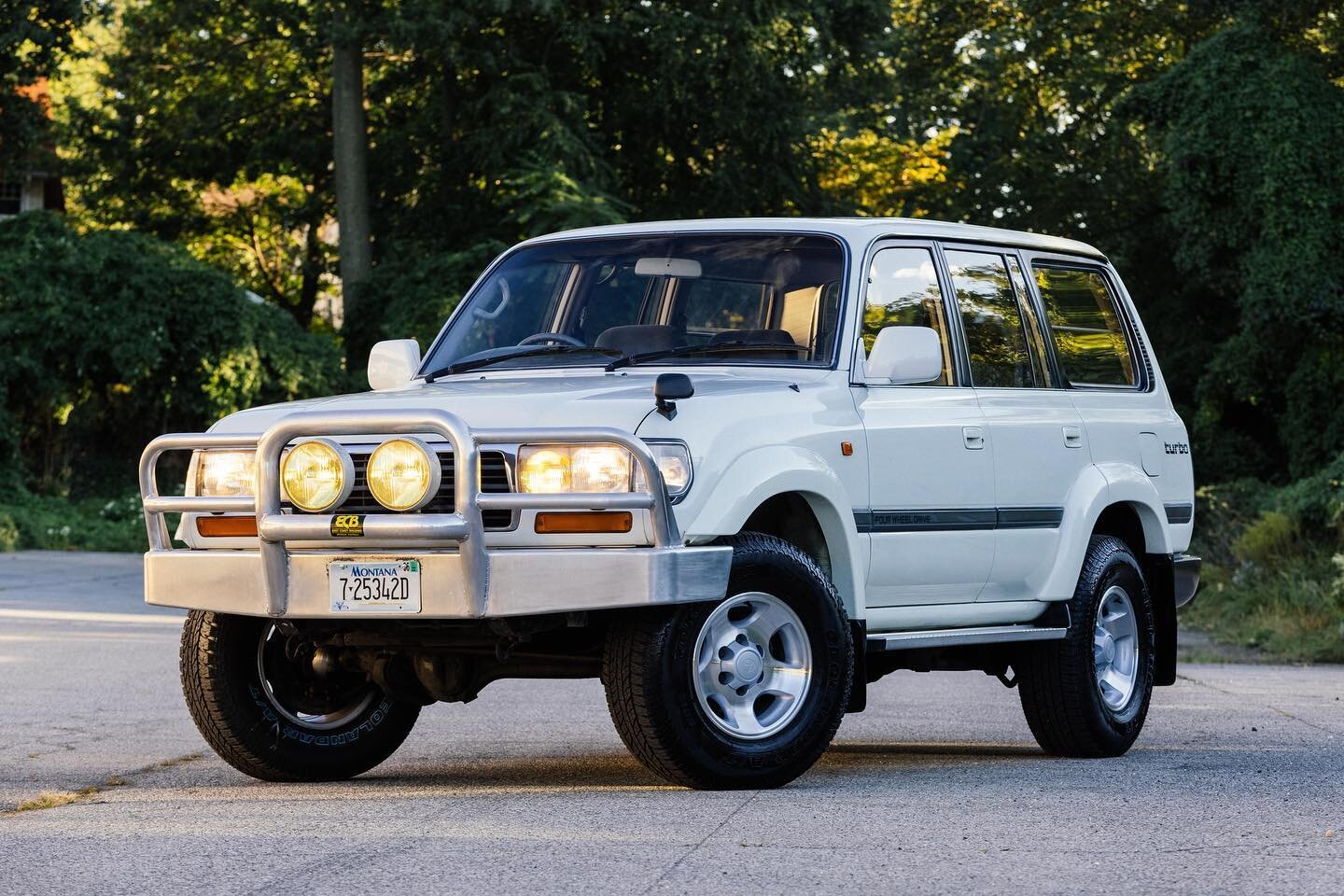 Now live on Bring a Trailer 
1995 Toyota Land Cruiser HDJ81 183,925 miles (~296,000 KM)
White over gray cloth upholstery 
4.2L 24-valve 1HD-FT Turbo Diesel inline-six 
Five-speed manual transmission 
Locking front, center, and rear differentials
Fold