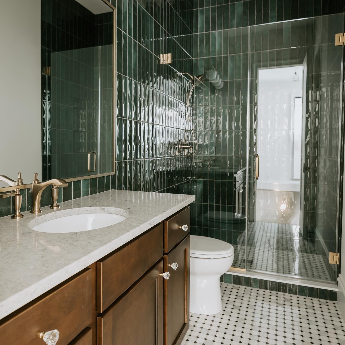 One of the most beautiful bathroom moments of our career ✨ 

Let&rsquo;s take a moment for the green tile and gold accent perfection 🤩