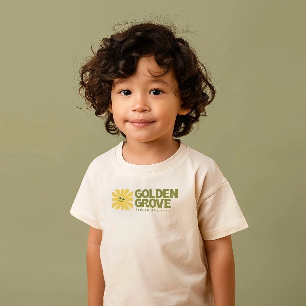 child in a daycare branded tshirt