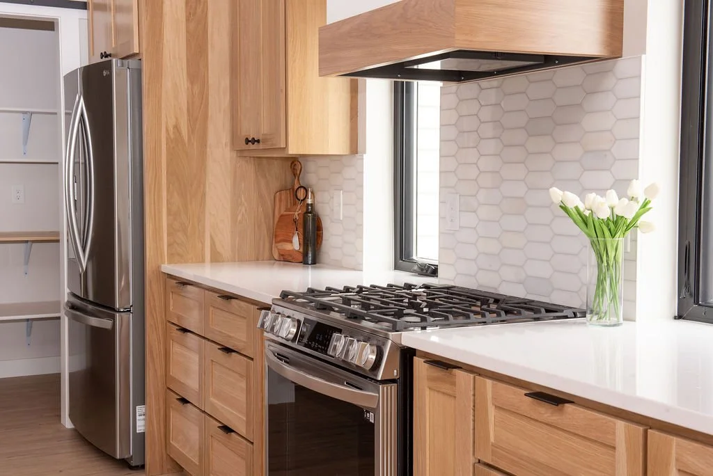 grand-meadow-mn-spec-home-tile-backsplash-kitchen.jpg