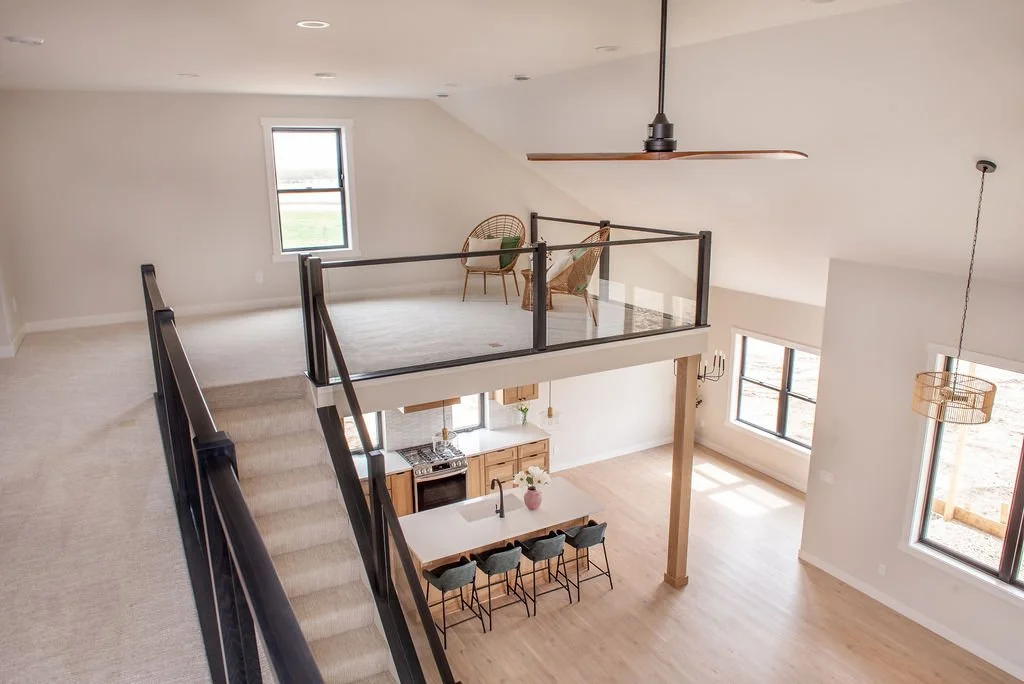 Loft with glass railing