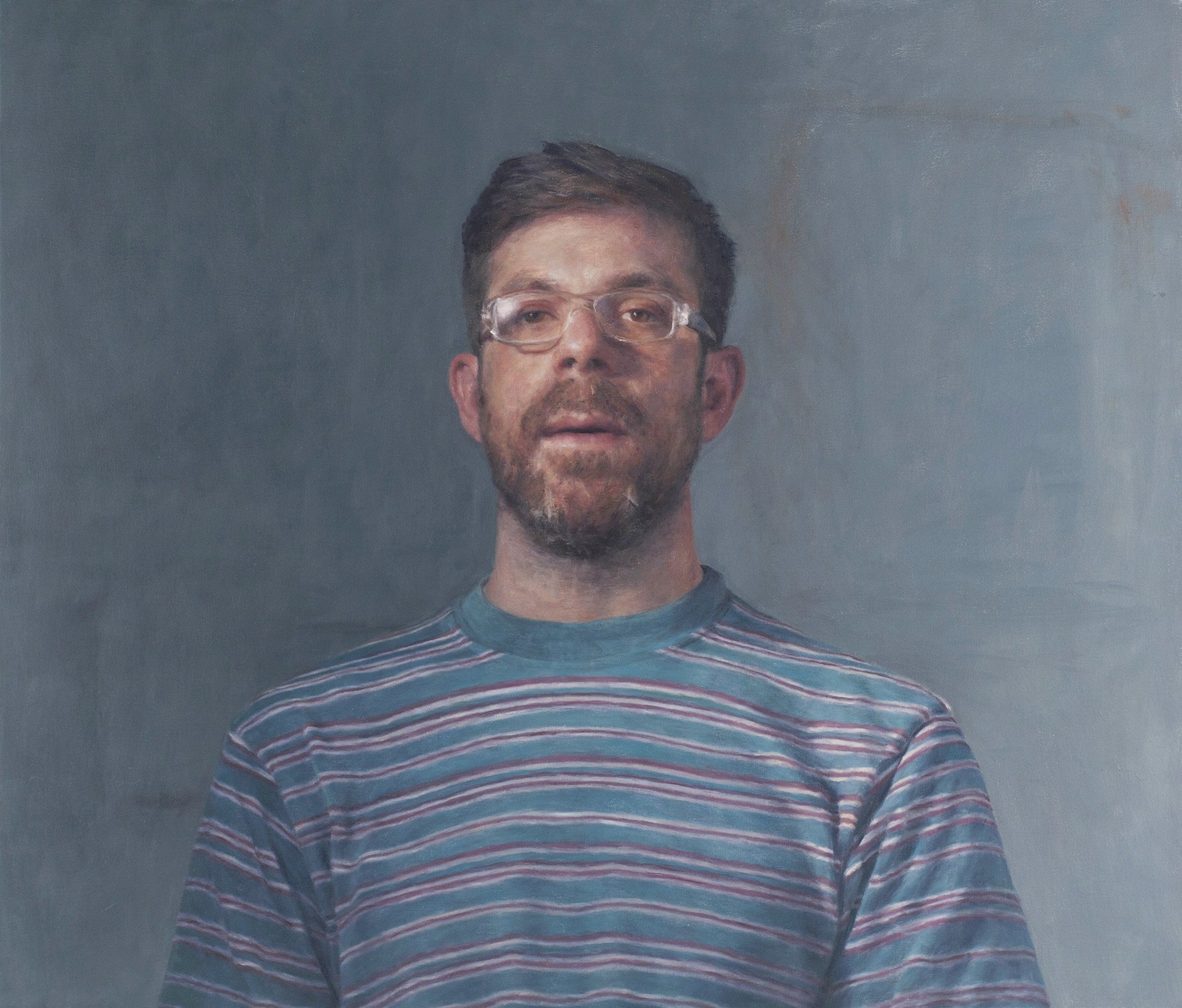 A.R. with glinting glasses