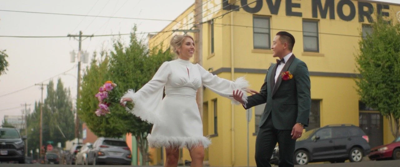 Maura and Shintaro dancing on a Portland sidewalk