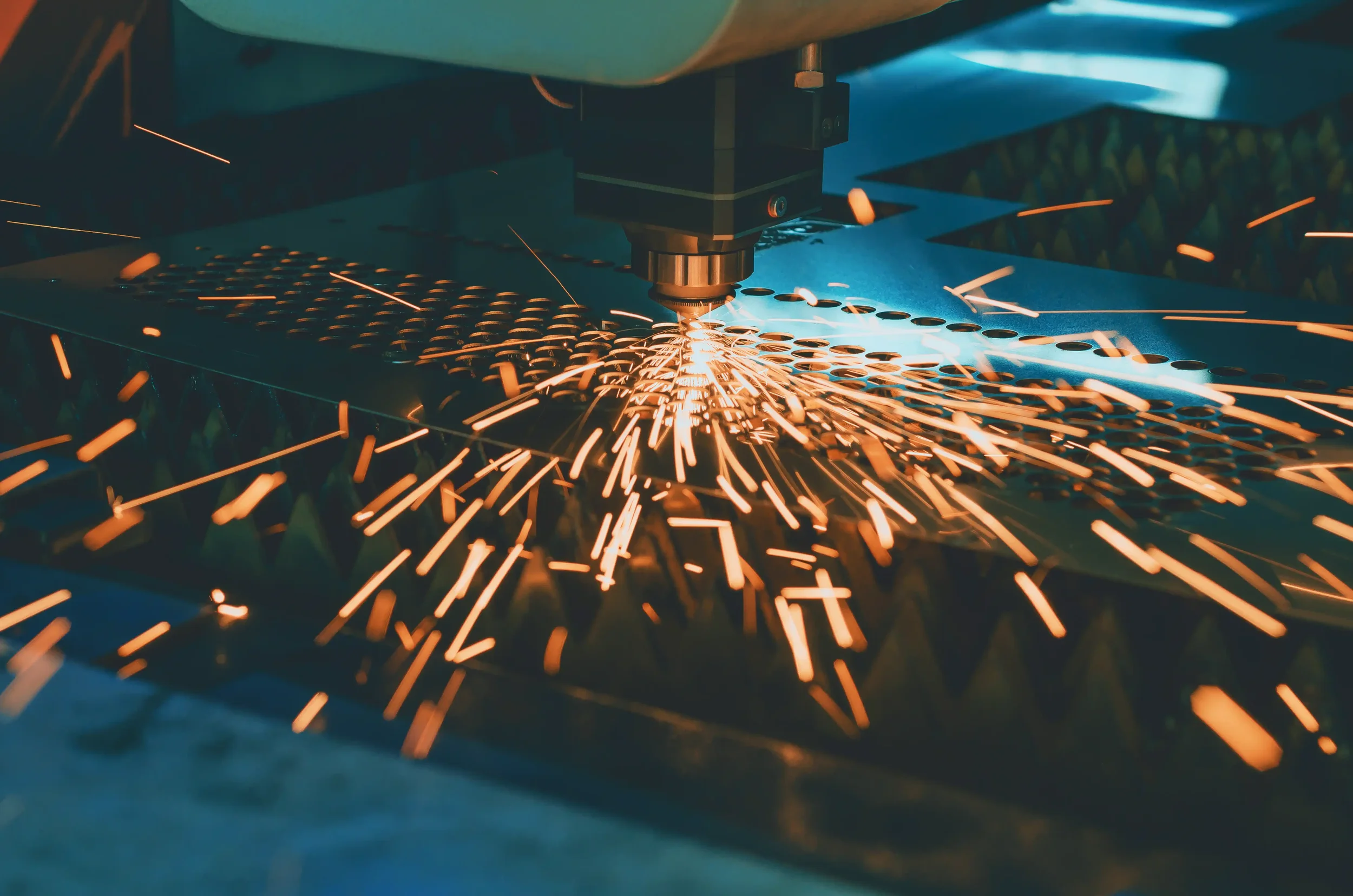 An image of a metal cutter in a factory