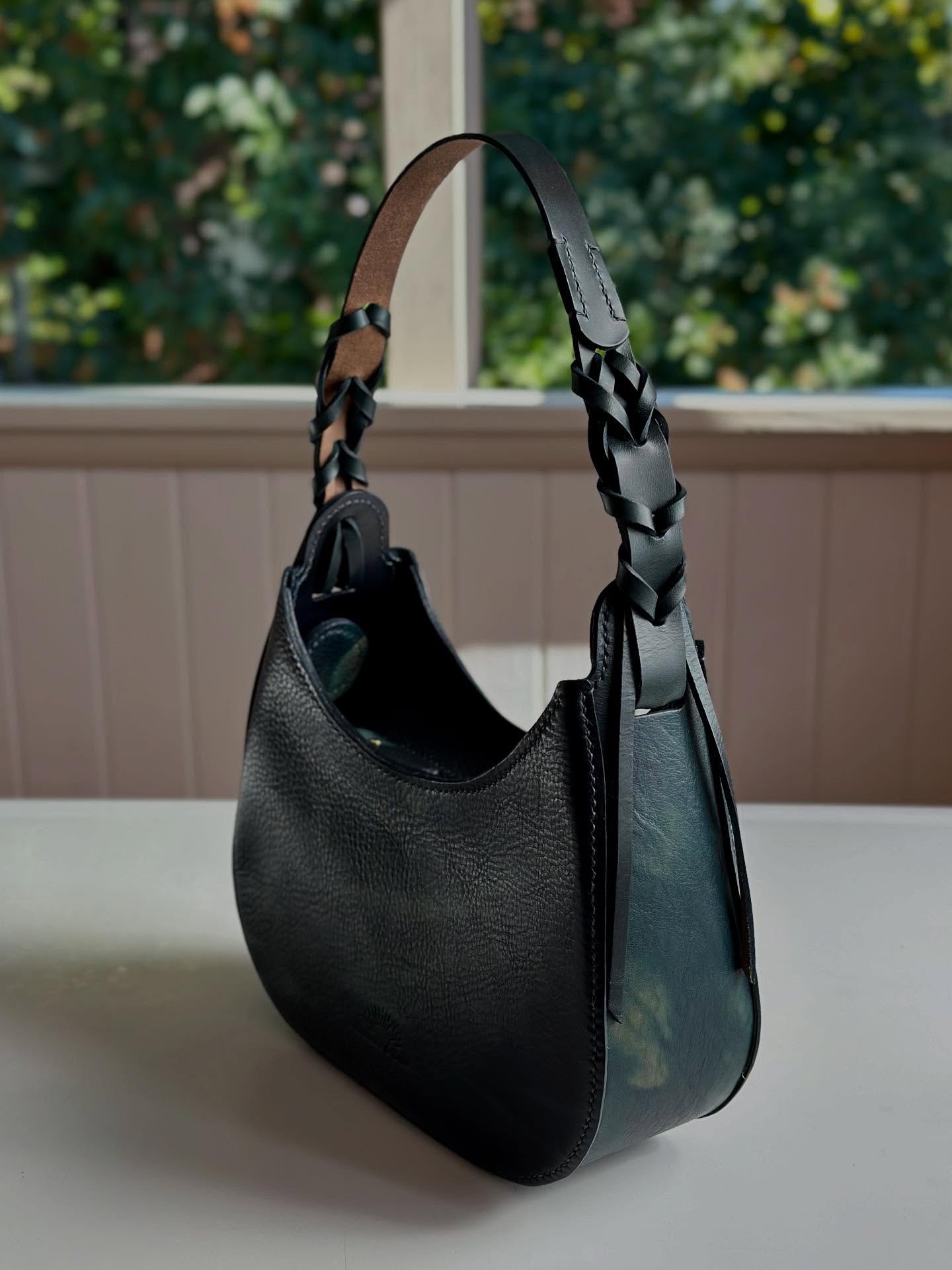I&rsquo;ve listed the dreamy blue Hobo Bag. 🦋

A few of my favorite details are the braided strap, the super smooth Riri zipper, and the dyed center inside panel (has subtle varying shades of deep blue). 

All the bags edges are dyed, burnished and 