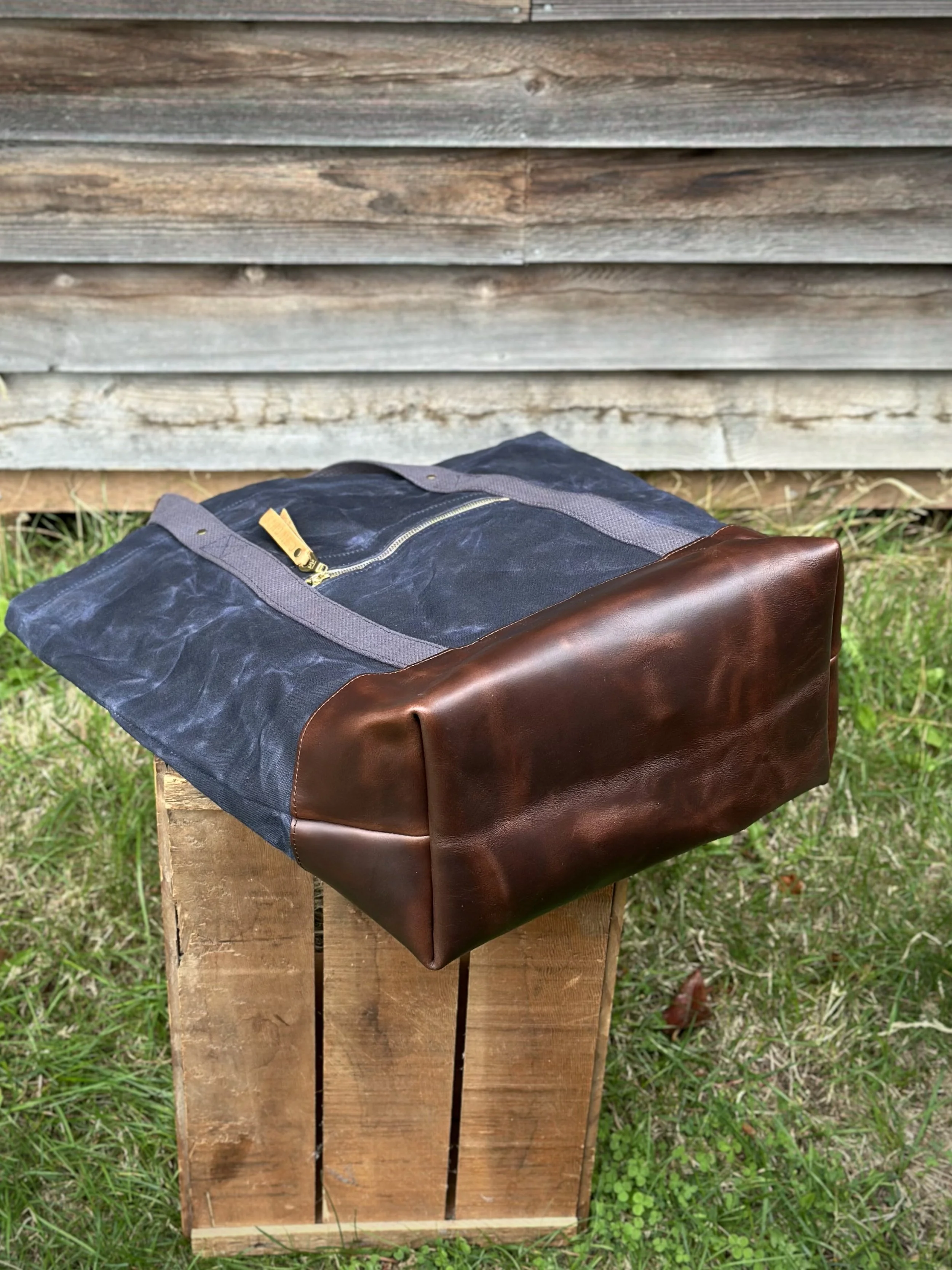 tedbagnavygreybrownleatherbottomview.jpg