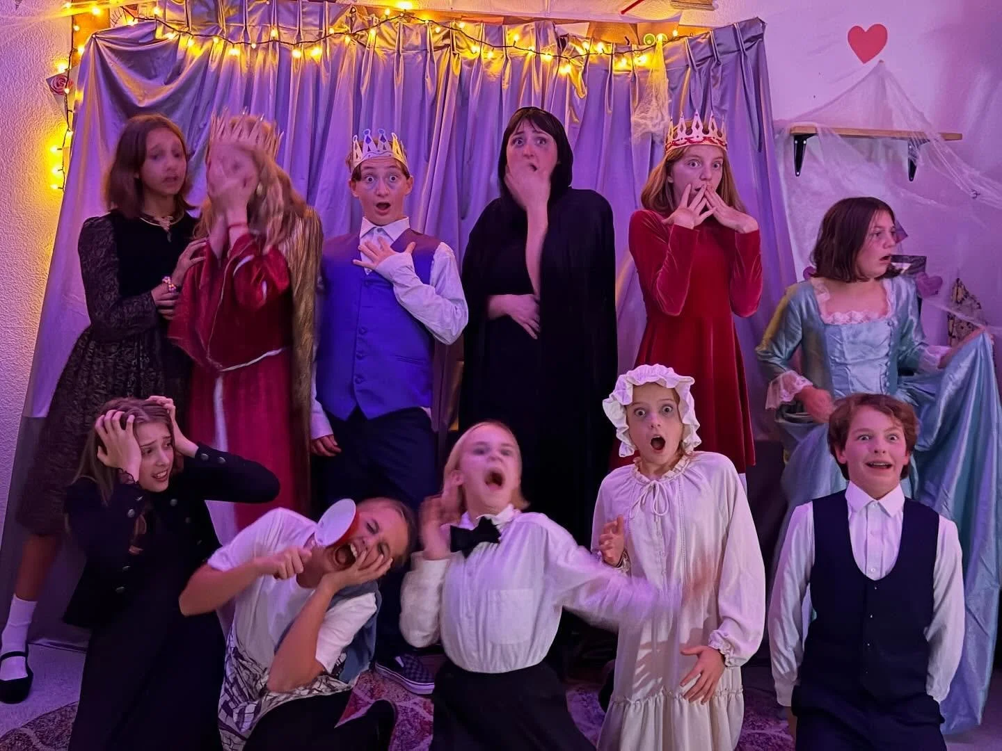 Theatre Company A in costume for their spoooky showcase. Guests encountered party guests gossiping, a royal family looking for the king, waiters squabbling in the kitchen, a princess demanding too much of her maid, and everyone being chased out by a 