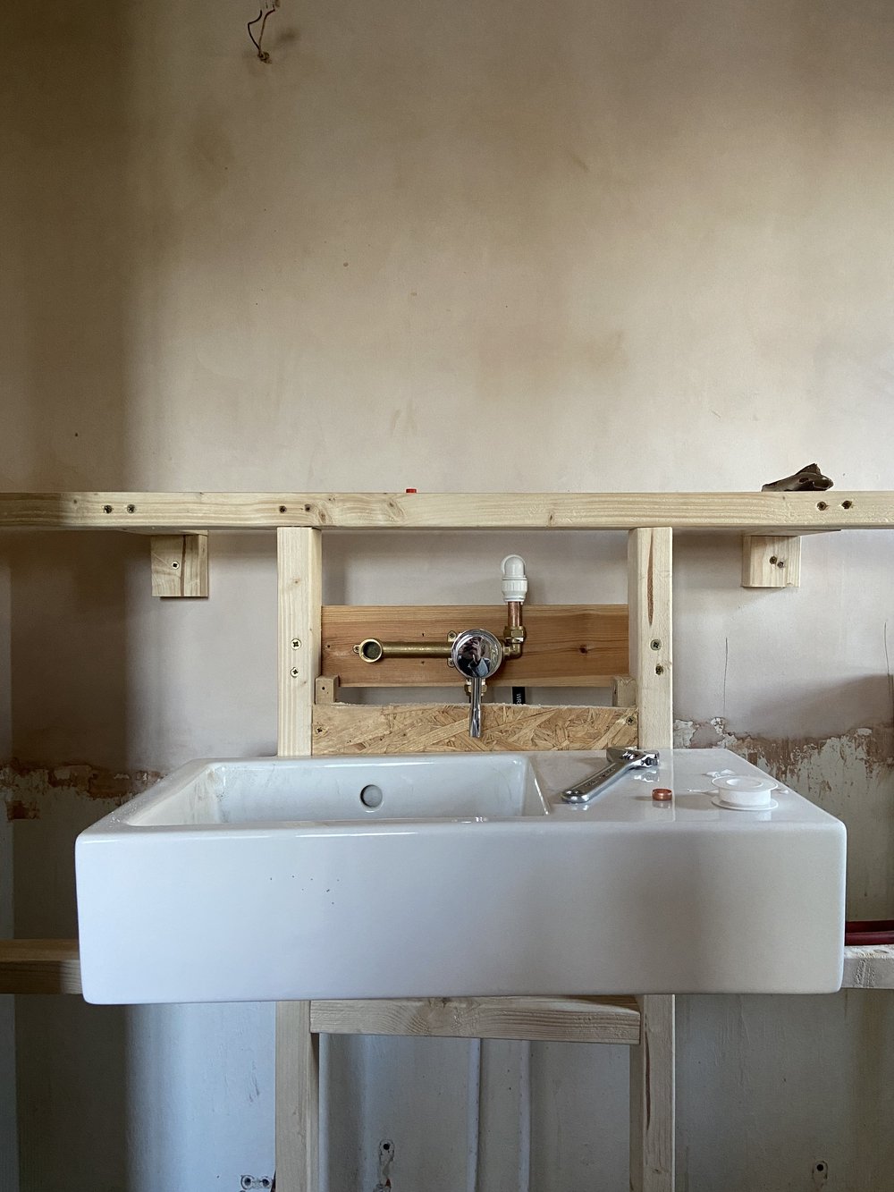 The new, wall hung sink.