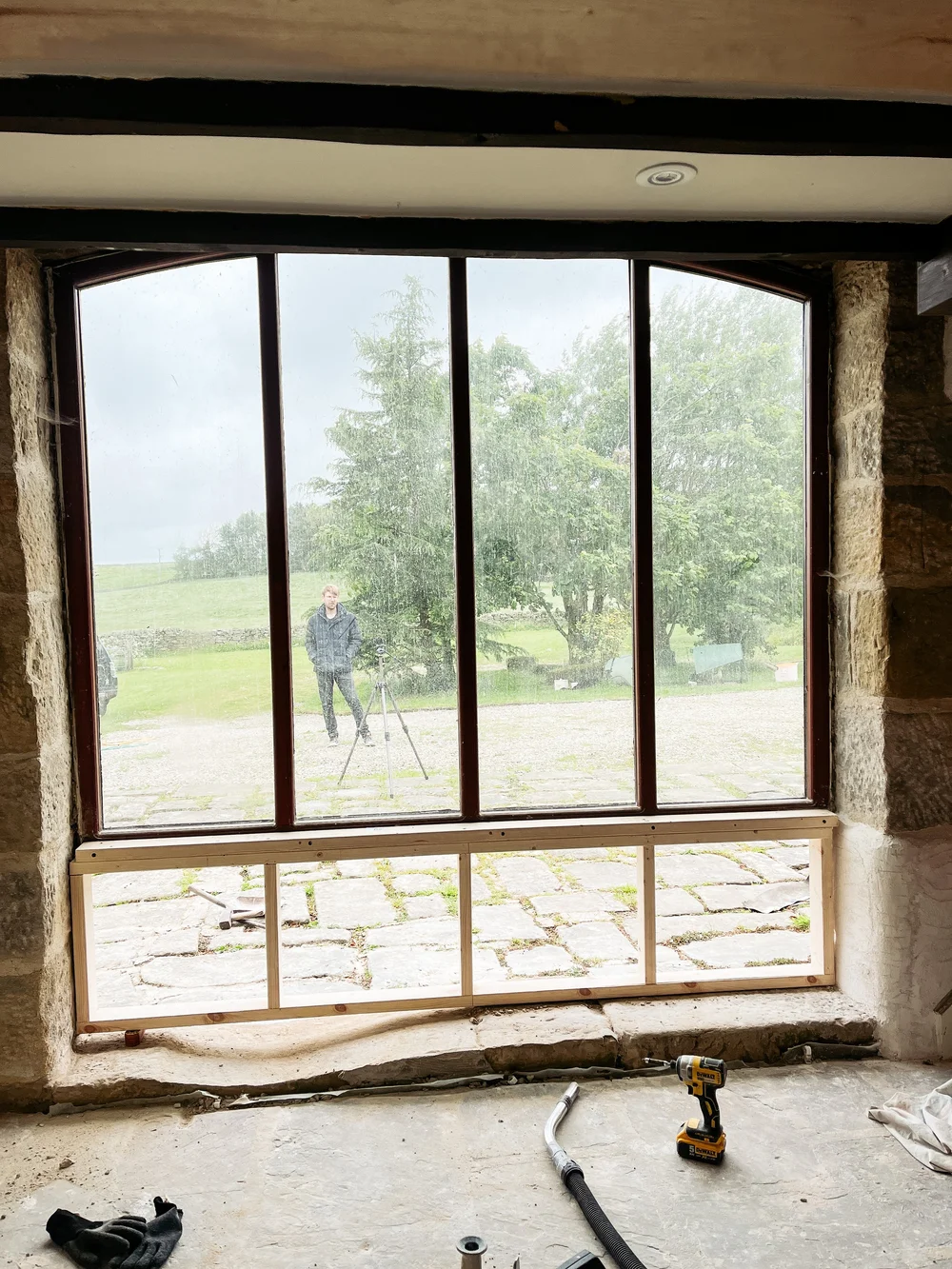 Wall out, and frame supporting the existing window