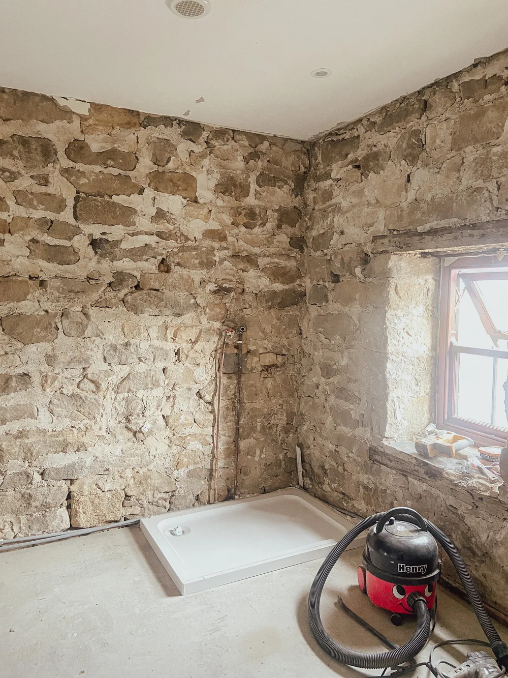 Back to stone, and freshly repointed