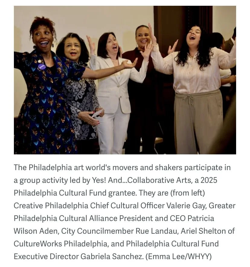A group of women celebrating and smiling, participating in a group activity led by Yes! And Collaborative Arts, a 2025 Philadelphia Cultural Fund grantee, with some women clapping and raising their hands.  | Yes! And Collaborative Arts