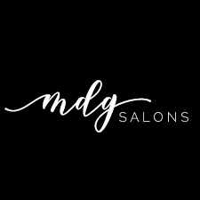 Logo with the text 'mdg SALONS' on a black background