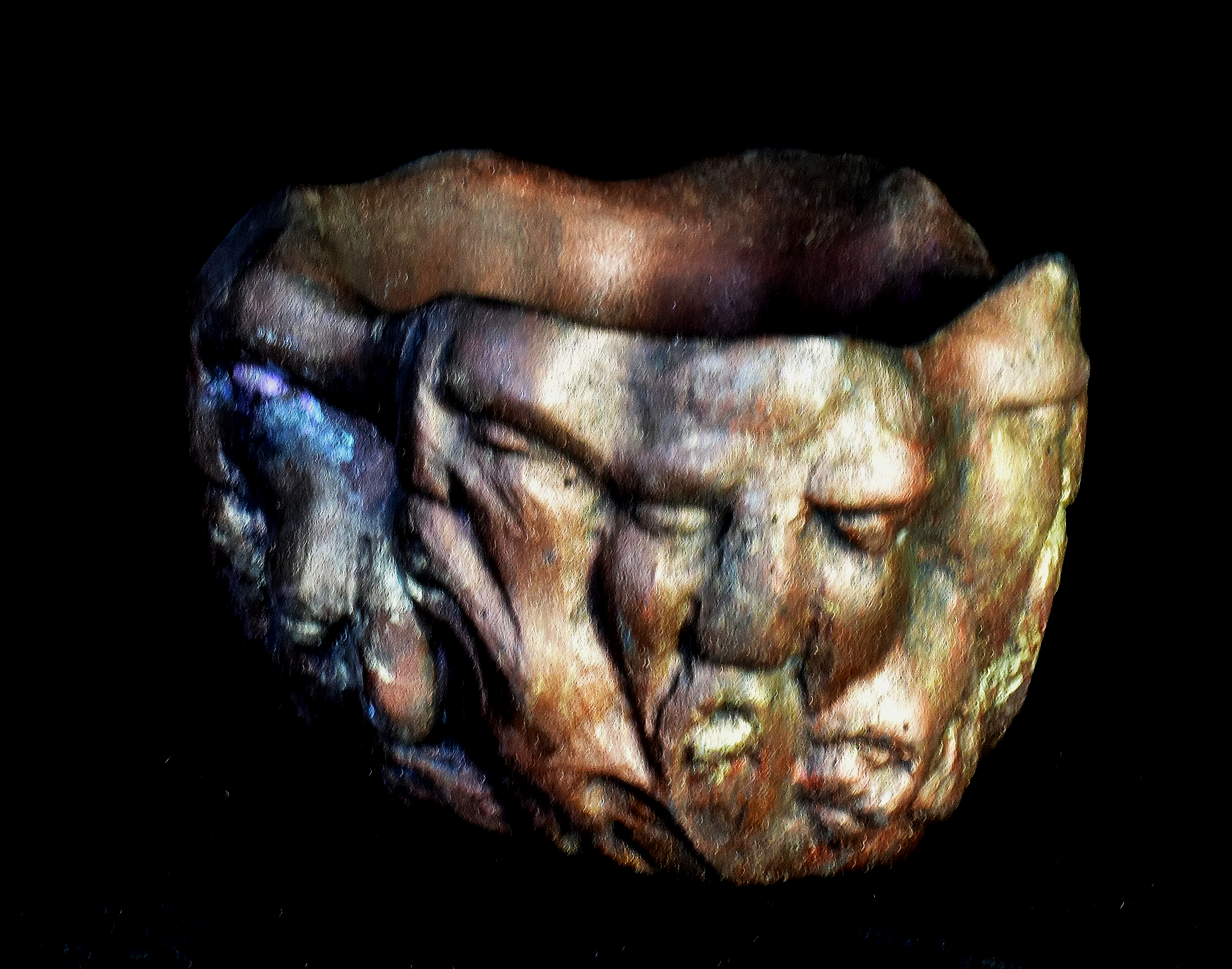 Close-up of a human skull with a dark background.