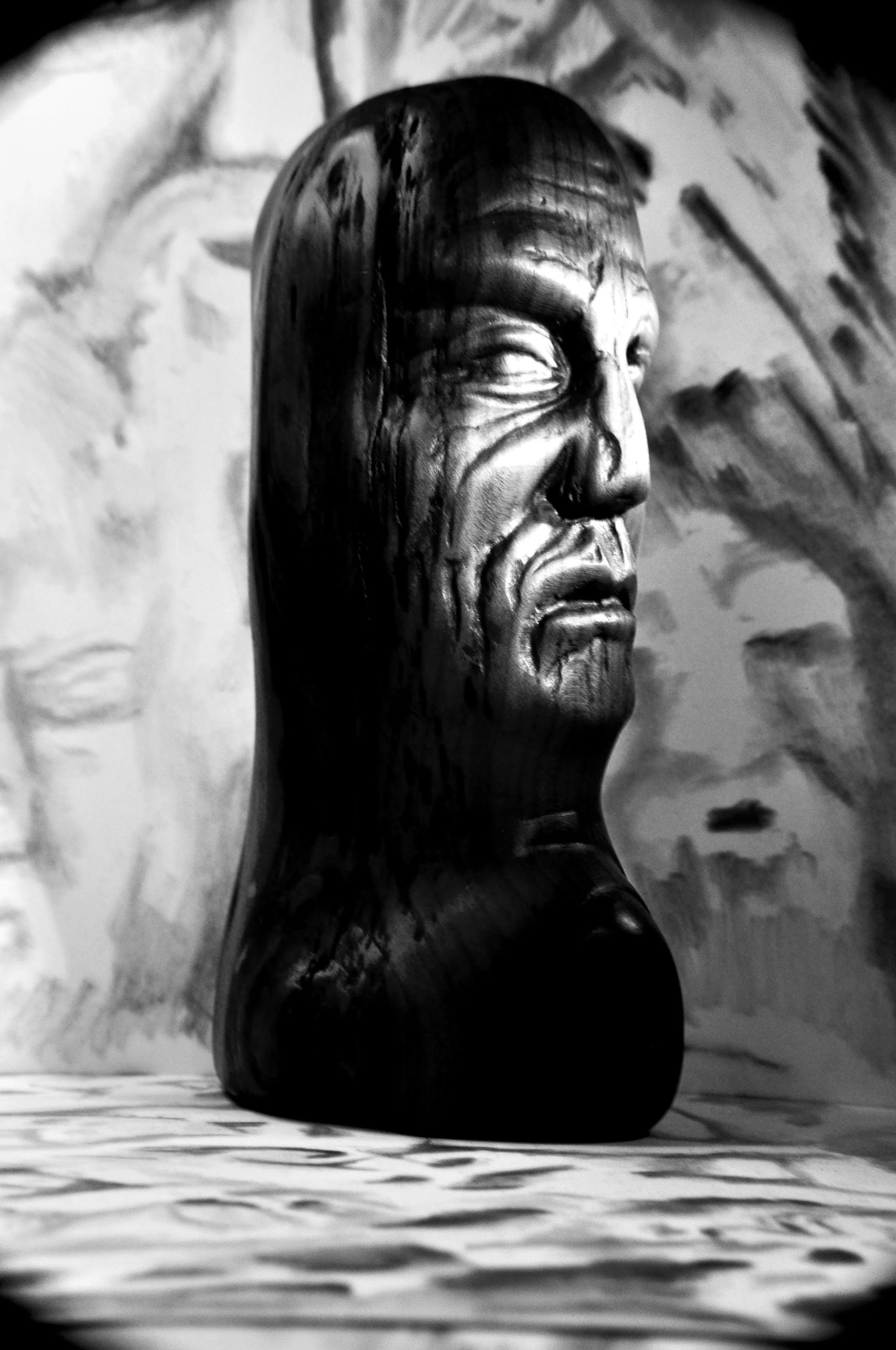                                 Just heads. hand made carved from a singel block of aged cherry wood 3 by 3 by 10 inches tall 