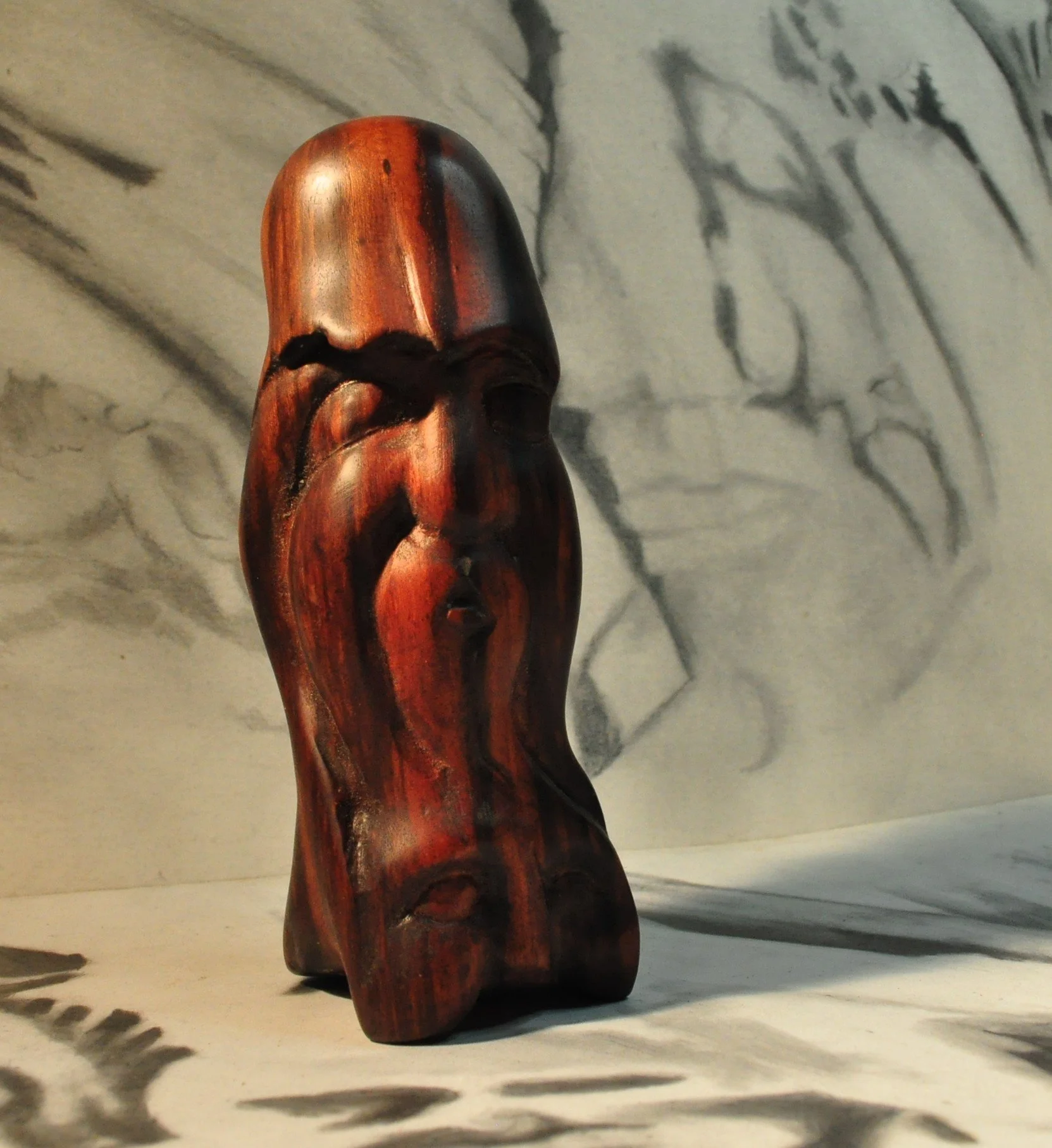 just head carved from GONCALO ALIVES central and south American 2 by 2 by 6 hand rubbed finishe