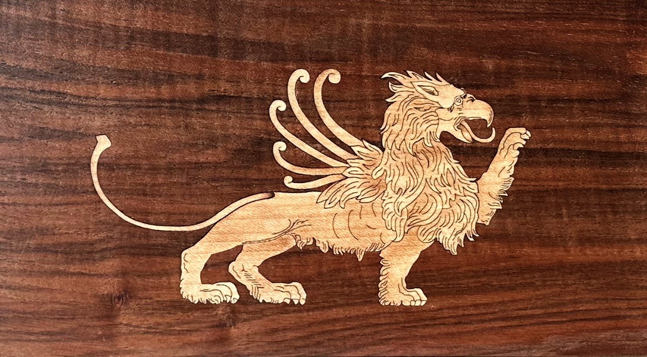Marquetry inlay in wood of the Venetian Griffen - symbol of Venice.