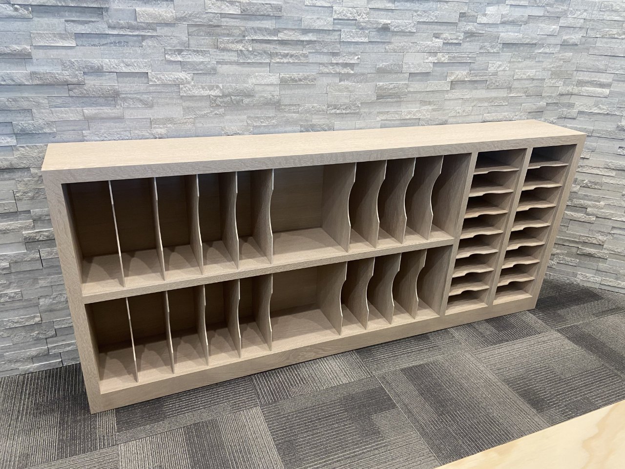Custom made office bookcase featuring quarter sawn white oak with a ceruse finish.