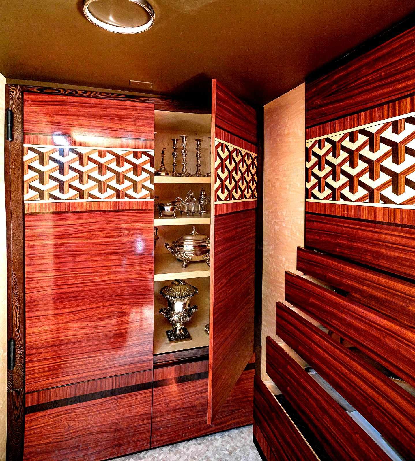 Custom built-in cabinets for a vault storing a collection of art treasures.