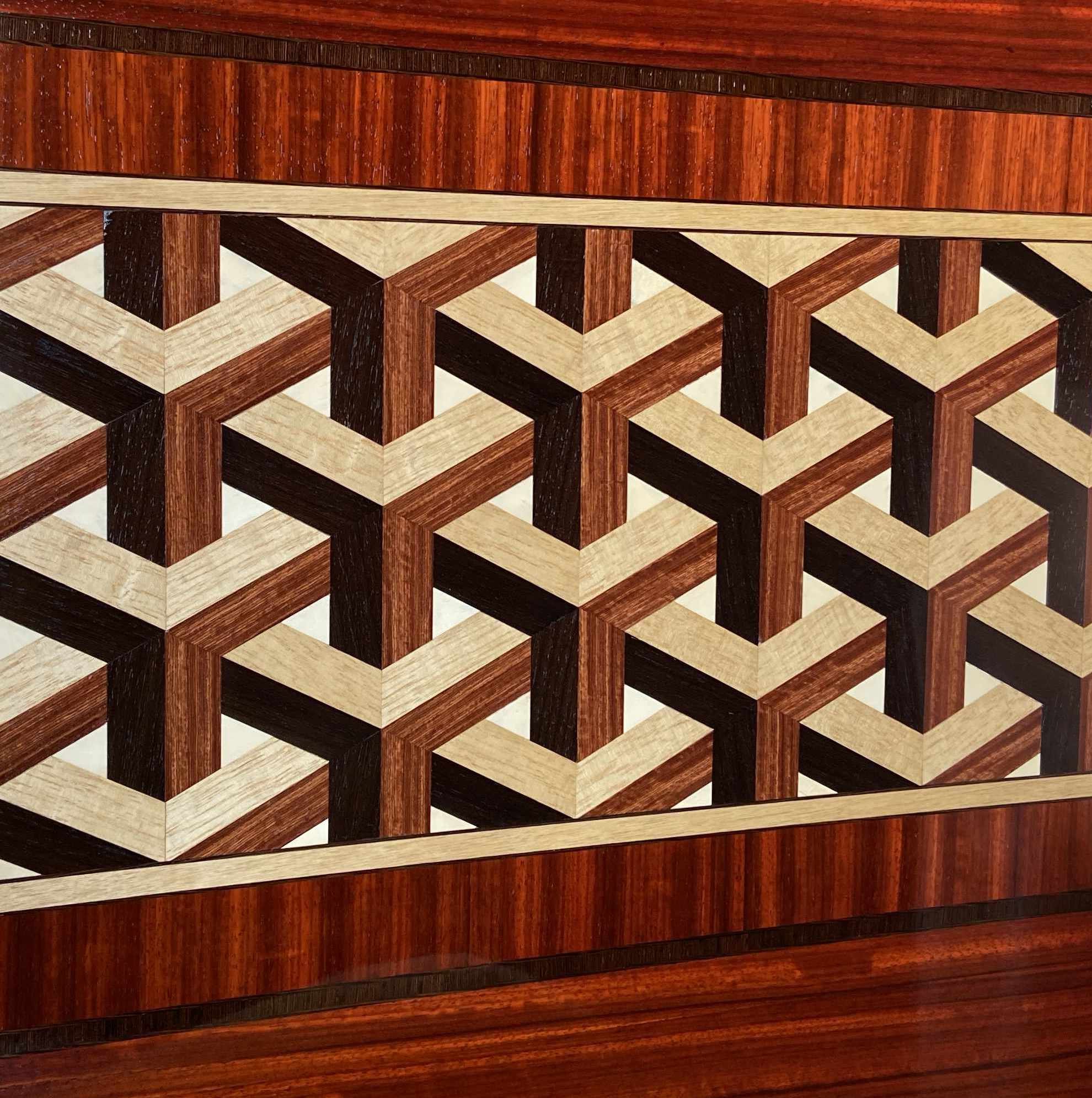 Parquetry design modeled from an M. C. Escher print used on custom cabinetry for a fitted private vault.
