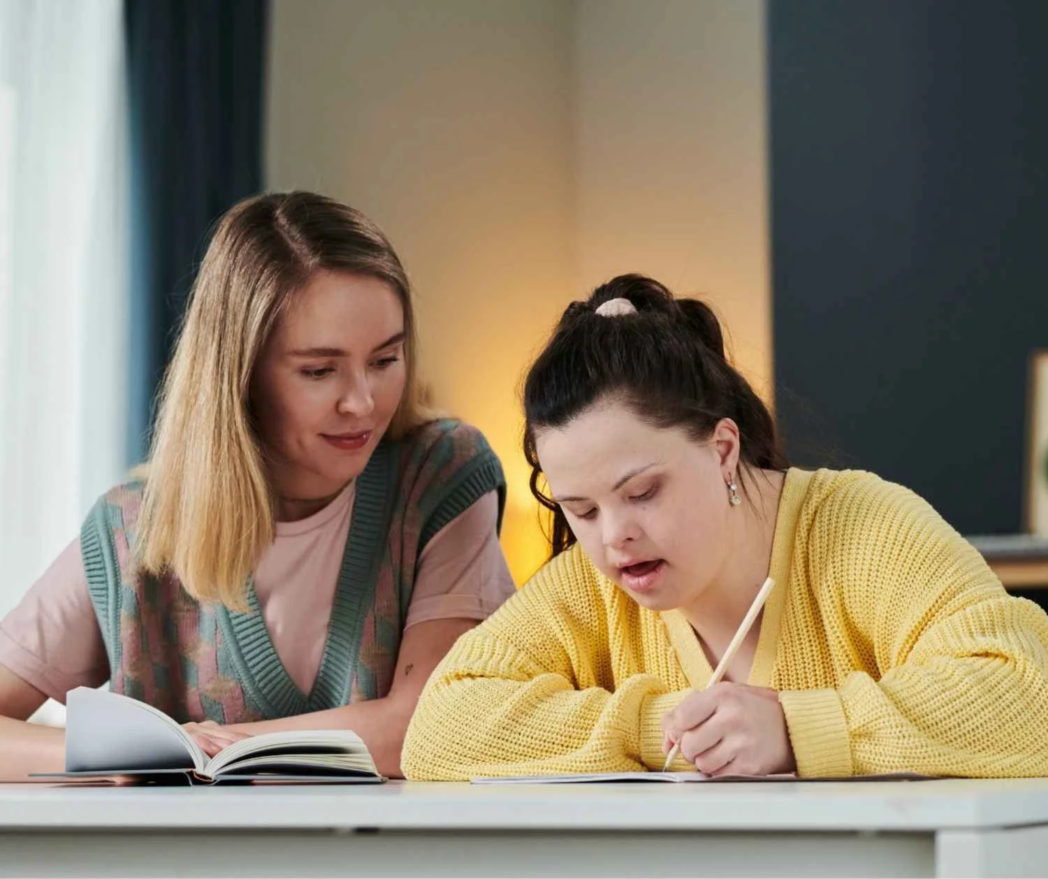 Adult woman with an intellectual disability talking with her sister