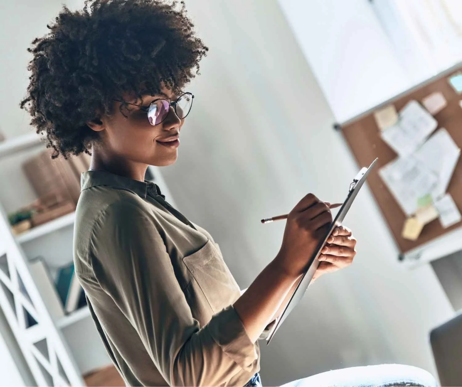 A woman checking things off her checklist