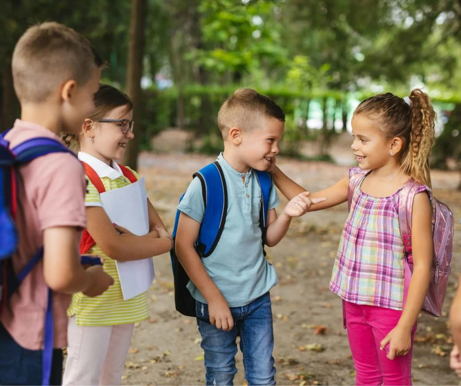 Group of children talking outside