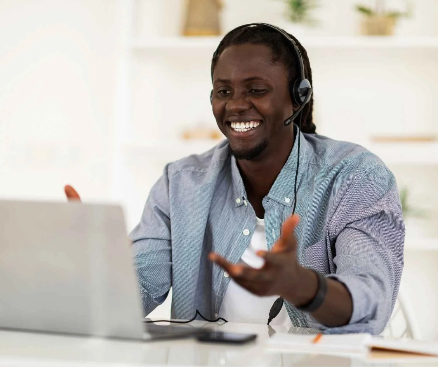 Man on a video call at his home desk