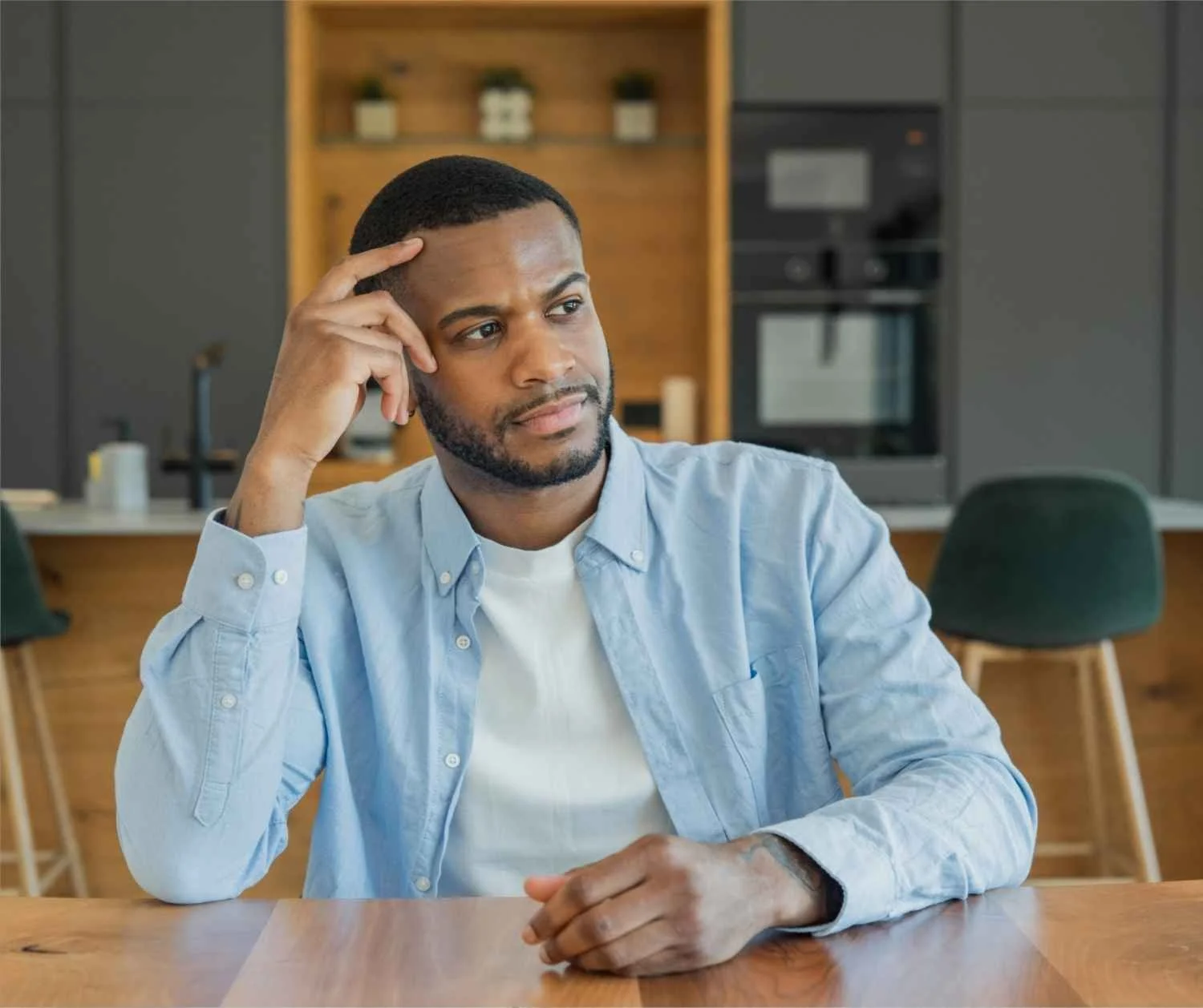 A man pausing to organize his thoughts before he speaks