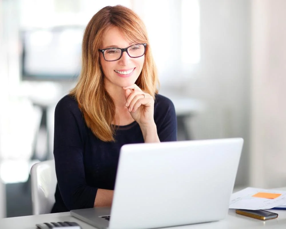 Adult in an online coaching session working on focus and planning
